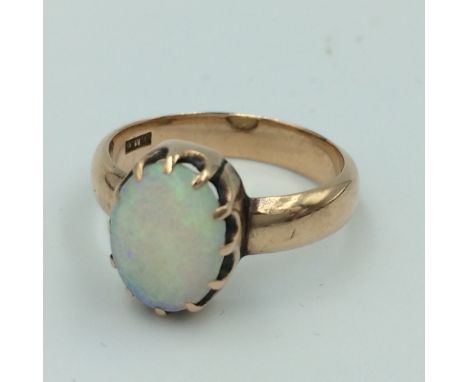 9ct Rose gold &amp; opal ring, central oval cabouchon opal 12 X 8mm 4.1g size Q 