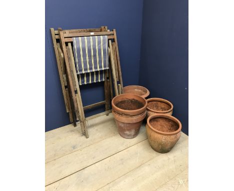 Vintage wooden deck chairs &amp; terracotta pots 