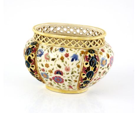 Zsolnay Pecs reticulated bowl, decorated with scrolling foliate and gilt design, impressed mark to base 1063, 16cm wide