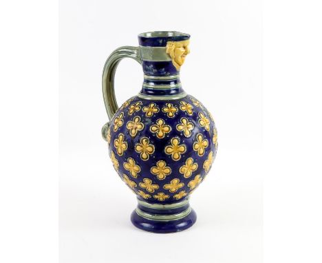 Minton Majolica blue ground vase with mask spout, restored. 28cm highCondition Report:  Previous chip and cracking around the