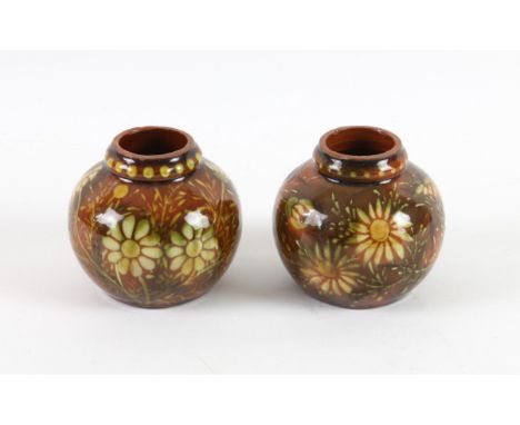 Pair of Linthorpe Pottery vases, of globular form decorated with daisies, stamped mark numbered 2205, 6.5 cm highCondition Re