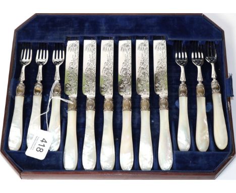 Six pairs of Victorian silver bladed mother of pearl handled dessert knives and forks 