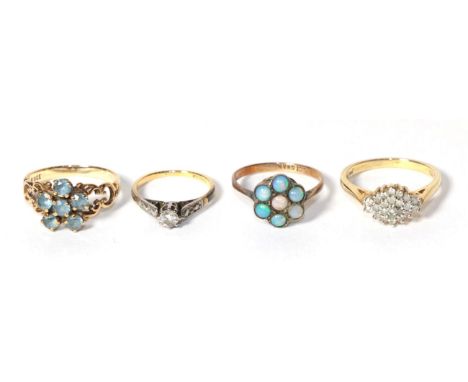 A 9 carat gold gem set ring, finger size L; two gem set rings stamped '9CT', finger sizes K and L; and another with marks rub