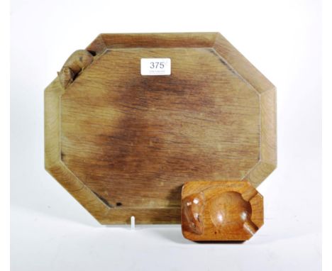 Robert 'Mouseman' Thompson of Kilburn: an English oak breadboard and and ashtray, each with carved mouse signature