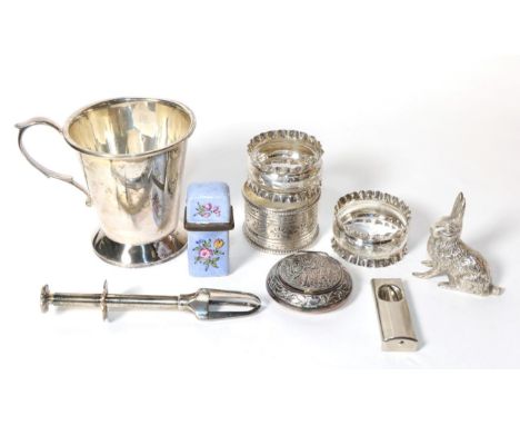 A 19th century enamel decorated scent bottle holder and contents (a.f.); silver napkin rings; silver cup; model of a hare; ci