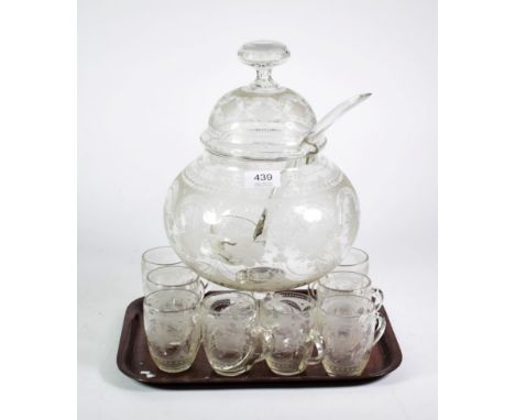 An etched glass punch set decorated with flowers, comprising of a pedestal punch bowl and cover, ladle and eight glasses