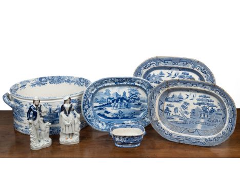 A collection of blue and white ceramics To comprise of a Spode foot bath; three meat plates and another oval dish; two Staffo