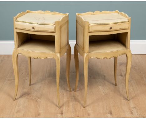 A pair of 20th century French Rococo-style bedside tables With shaped galleried tops above a frieze drawer and an open shelf,