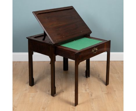 A George III mahogany architect's table The top with a bifold rising and tilting mechanism, the drawer to the front with inte