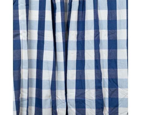 A pair of lined curtains With a wide blue check pattern on a cream ground.Each 270cm high x 260cm wideQty: 2Some fading to th