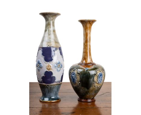 Two Royal Doulton vases The first by E. Violet Hayward, the body decorated with classical profiles within scrolling cartouche