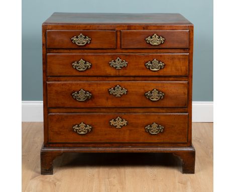A George III mahogany caddy-top chest of drawers With two short over three long graduated drawers.91cm wide x 55cm deep x 96c