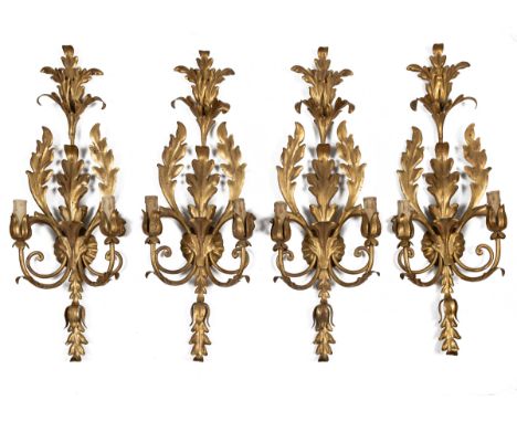 A set of eight twin-branch wall lights together with a matching four-branch chandelier With gold-painted oak leaf decoration.