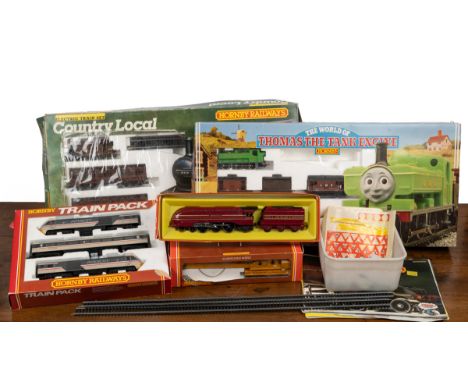 A collection of '00' gauge Hornby To include a boxed Hornby train pack with two intercity trains and a carriage; a Triang Hor
