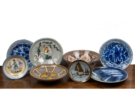A collection of ceramics To include a 19th century faienceware plate with a hand-painted figure in the centre, 23cm diameter;