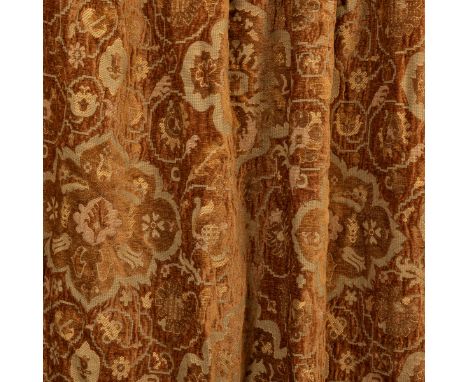 A set of lined curtains The rust ground with foliate decoration throughout and brocaded borders.The first pair 300cm long x 1