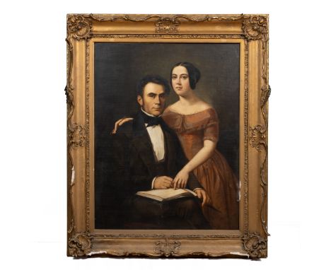 19th Century School A portrait of a husband and wife, oil on canvas, unsigned, set within a decorative gilt gesso moulded fra
