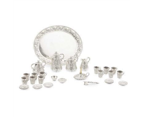 A miniature 19th century continental tea set marked for Belgium, comprising a tea tray, hot water pot, teapot, twin handled s