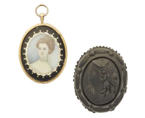 A Regency miniature presented in an oval frame with black enamel detail; together with a jet cameo with silver brooch fitting