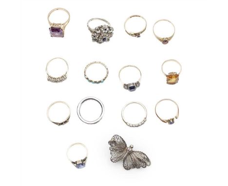 A collection of gem set rings to include a synthetic colour change sapphire cocktail ring, a large blue and colourless paste 