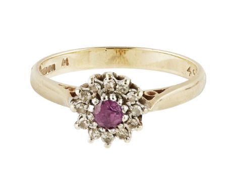 A 9ct gold ruby and diamond set cluster ring claw set with a round cut ruby in a single border of eight-cut diamonds, to a pl