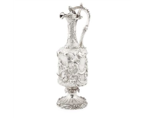 A Victorian claret ewer J E Terrey &amp; Co., London 1843, of baluster cylindrical form, heavily embossed vine and floral det