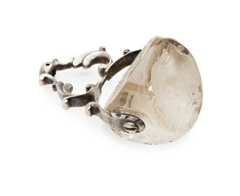 An early 19th century rock crystal swivel seal composed of two armorials and one double portrait intaglio, the mount of of sc