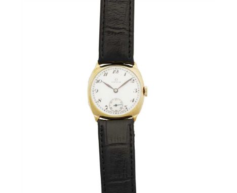 A 9ct gold 1930s cased wristwatch, Omega in a cushion shaped case, white dial, subsidiary seconds dial, manual movement, bi-m