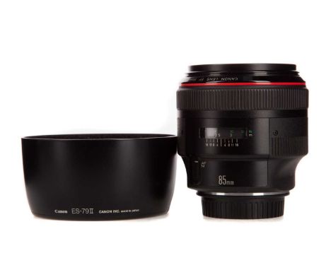 CANON EF 85MM 1:1.2 L ULTRASONIC LENS,complete with front and rear caps and lens hoodMounting ring and body show light signs 