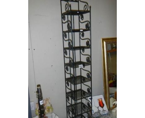 An eight shelf book/DVD stand, COLLECT ONLY.