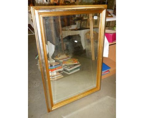 A gilt framed bevel edged mirror, COLLECT ONLY.