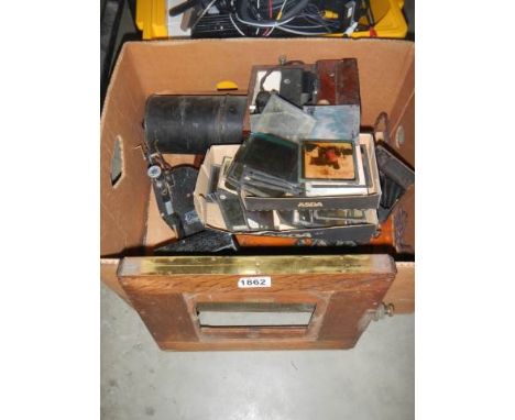 A box of magic lantern spares.