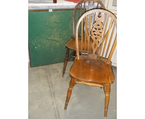 A pair of wheel back chairs and a card table, COLLECT ONLY.