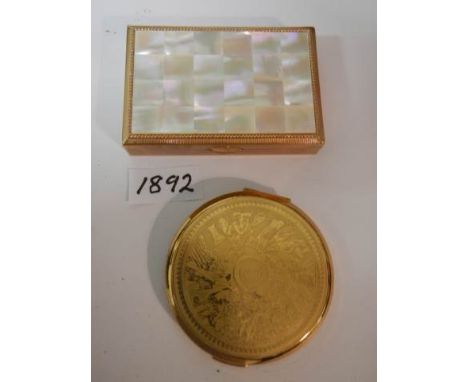 A Stratton powder compact and one other.
