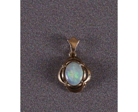 A 9 carat BWG pendant with an oval cabochon cut opal.