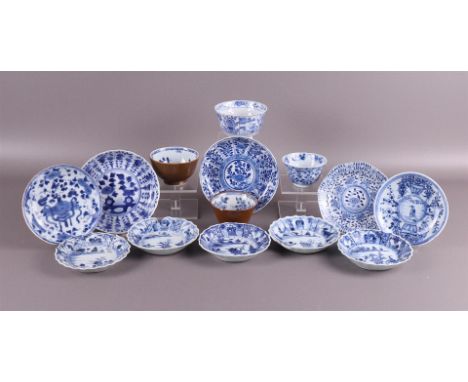 A lot of various blue/white porcelain cups and saucers including Kangxi, China, 18th century, tot. 14x (damages).