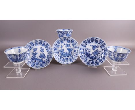 Three blue and white porcelain contoured cups with saucers, China, Kangxi, around 1700. Blue underglaze parsley decor, marked