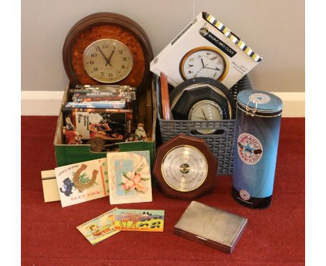 Two boxes of miscellaneous. Quartz wall clocks, Barometers, dvds to include vintage postcards, birthday card examples etc  