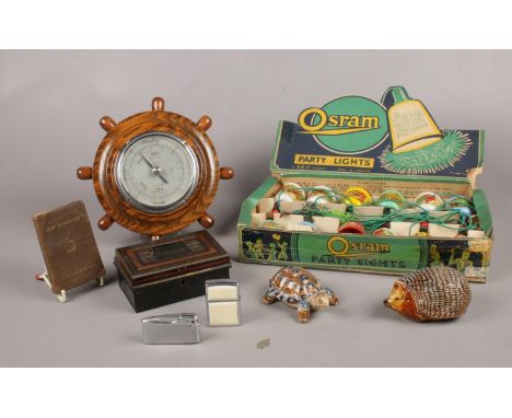 A group of collectables. Wade ceramic Tortoise &amp; Hedgehog ornament, Osram Party lights (boxed), Zippo &amp; Flicker light