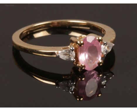 A 9ct gold Mozambique pink spinel &amp; zircon ring with COA. Size K. Weight 1.78g.  
