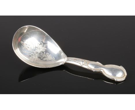 A Victorian silver caddy spoon. Assayed Birmingham 1882 by Hilliard &amp; Thomason. (16g).  Slight tarnishing to underside of