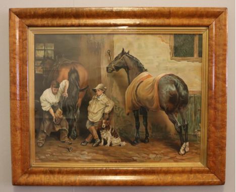 An early 20th Century figured walnut framed lithograph print, after Greenhill, The Village Blacksmith.  
