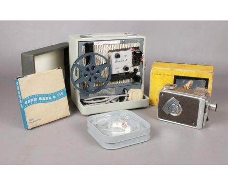 A group of photographic equipment. Kodak Brownie 8 Movie Projector Model A15G, Brownie 8 mm movie camera Model 2 , Photax cin