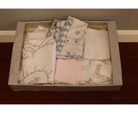 A box of vintage linen. Tablecloths, napkins examples etc.  