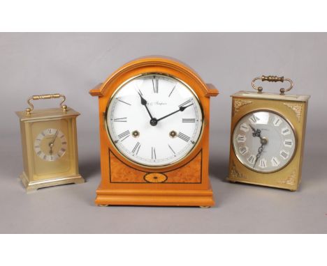 A collection of three clocks. Fox &amp; Simpson mantle clock, Bentima &amp; President quartz carriage clocks.  