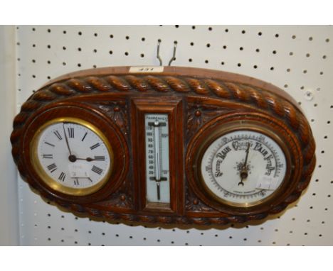 A late 19th century oak mounted combination clock/barometer, c1880