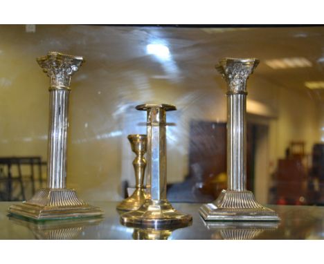 A silver table candlestick,  another;  a pair of plated candlesticks (4)