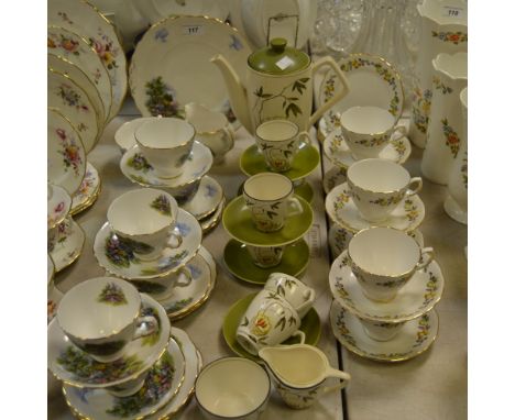 A Royal Vale plate tea service including cake plates; another similar; a Crown Devon Sweet Chestnut pattern coffee service (3