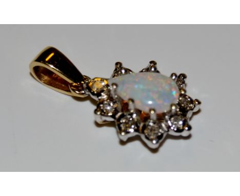 An opal and diamond pendant