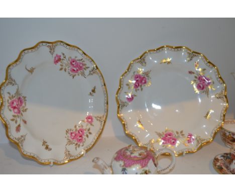 A pair of Royal Crown Derby Pinxton Roses pattern, fluted edged plates.